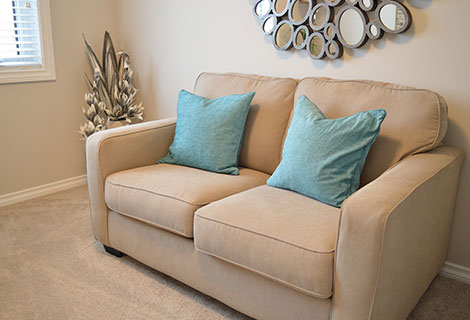 sofa set with blue pillows