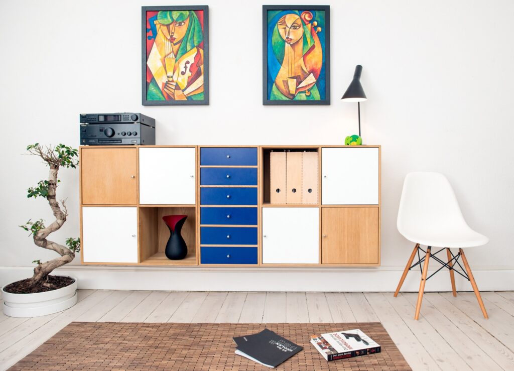 Wall interiors with chair and pictures