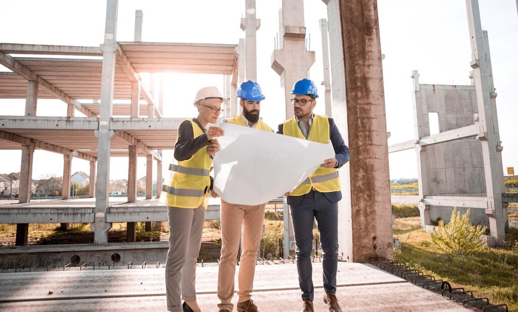 Architects discussing over a plan