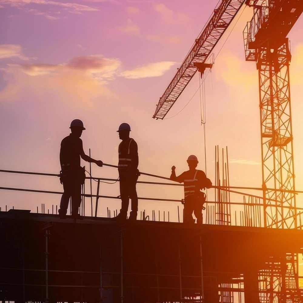 construction-8760339_1280 Architects working in evening